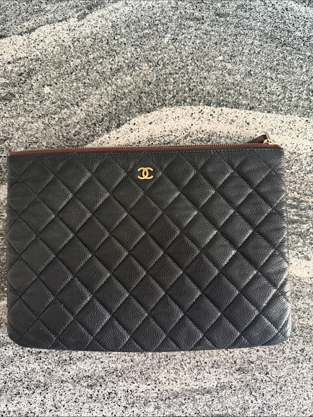 CHANEL Quilted leather clutch